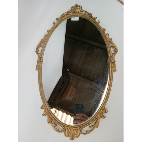 231 - Oval Gilt Framed Mirror, 68cm x 38cm.