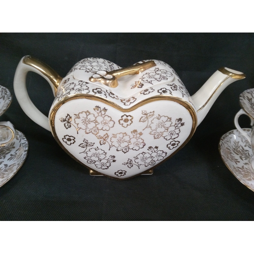 782 - A Crown Derby Bone China Tea Set with Websters Heart Shaped Tea Pot.