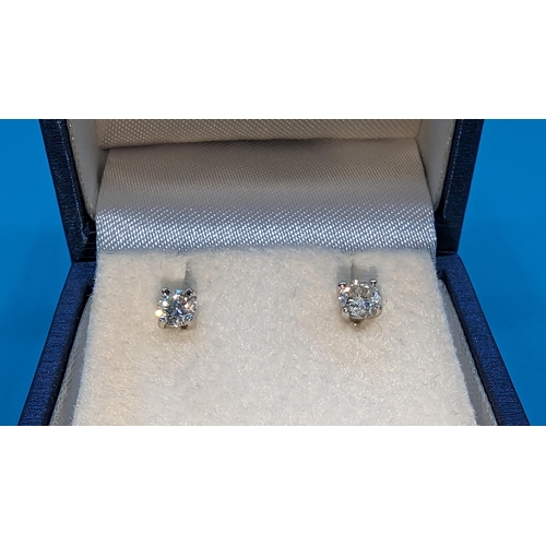 478 - A Pair of 18ct White Gold Round Brilliant Cut Diamond Studs approximately 0.40ct. Boxed.