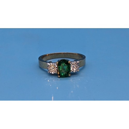 461 - 9ct Yellow Gold Ring Set with an Oval Emerald flanked by two Diamonds. Emerald 0.50ct (chipped). Dia... 