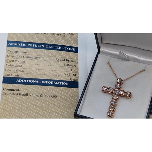 483 - 9ct rose gold cross set with round brilliant cut diamonds on a 9ct rose gold chain.  Diamonds 3.36ct... 