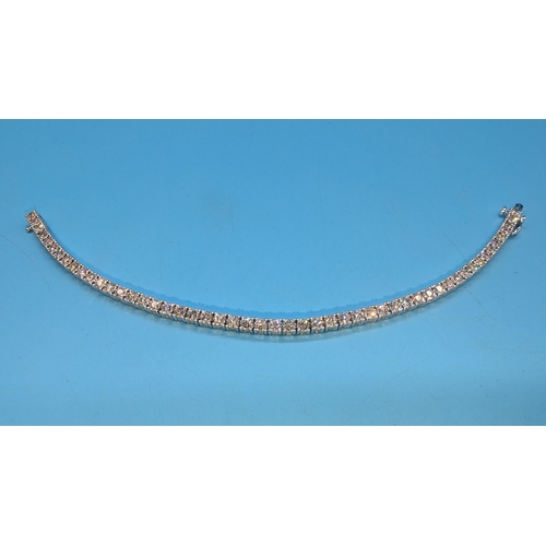 485 - Round brilliant cut diamond line bracelet set in 9ct white gold.  Diamonds 3.77ct.  Boxed