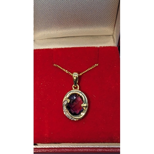 486 - 9ct yellow gold amethyst and diamond pendant on 9ct chain.  Boxed