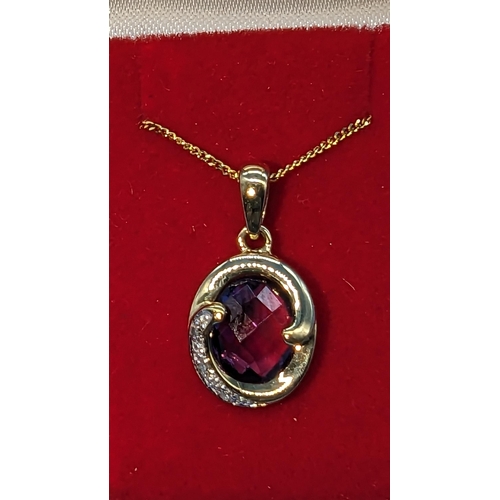 486 - 9ct yellow gold amethyst and diamond pendant on 9ct chain.  Boxed