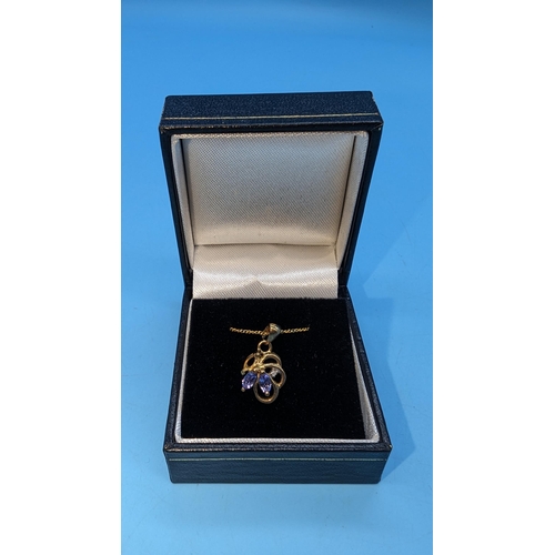 480 - 9ct yellow gold tanzanite and diamond pendant on chain (stone missing).  Boxed. Tanzanite Stone Miss... 