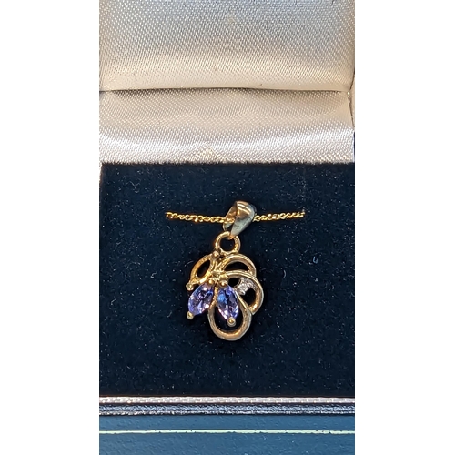 480 - 9ct yellow gold tanzanite and diamond pendant on chain (stone missing).  Boxed. Tanzanite Stone Miss... 