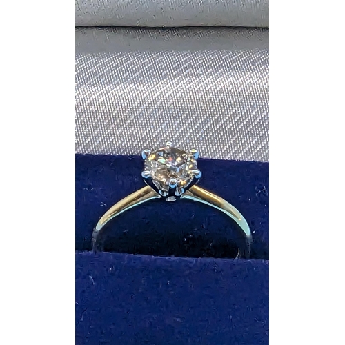 464 - 18ct yellow and white gold 6 claw round brilliant cut solitaire diamond ring.  Diamond 1.01ct.   Box... 