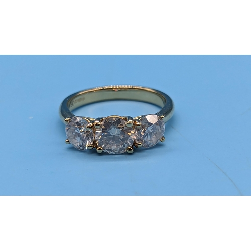 452 - 18ct yellow gold trilogy ring set with round brilliant cut diamonds.  Diamonds 2.34ct.  Original WGI... 