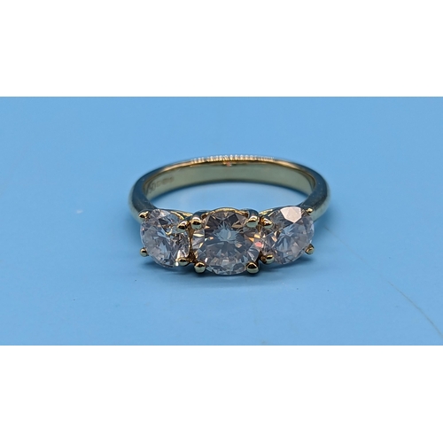 452 - 18ct yellow gold trilogy ring set with round brilliant cut diamonds.  Diamonds 2.34ct.  Original WGI... 