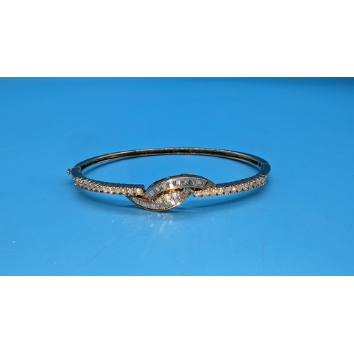 474 - 9ct yellow gold diamond set bangle.  Diamonds approx. 1.25ct