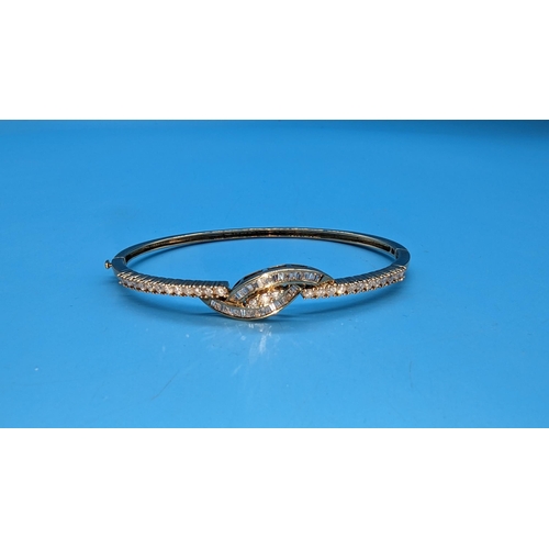 474 - 9ct yellow gold diamond set bangle.  Diamonds approx. 1.25ct