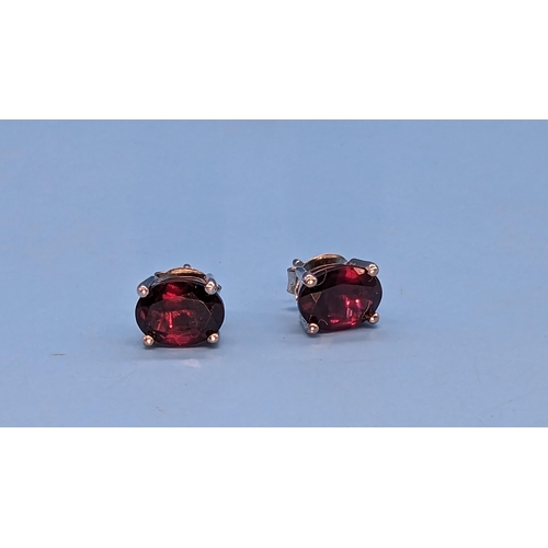 525 - Pair rhodolite garnet studs set in silver