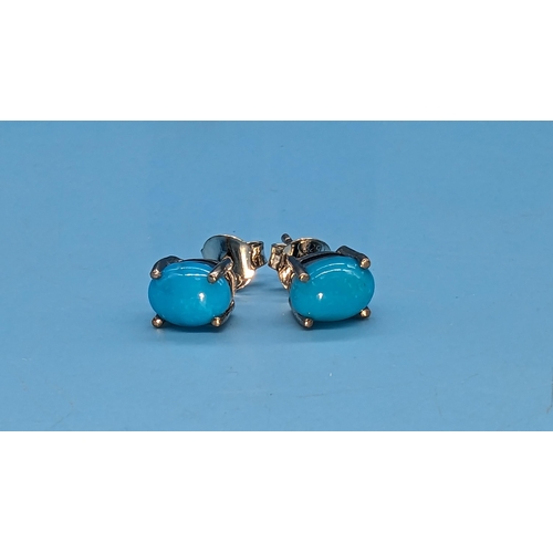 523 - Pair oval turquoise studs set in silver