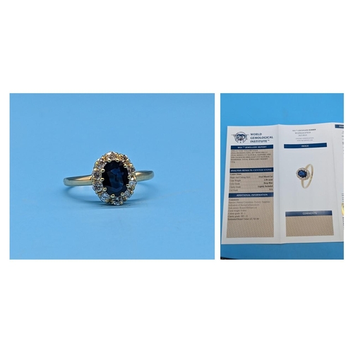 453 - 18ct yellow gold sapphire and diamond cluster ring.  Sapphire 1.50ct.  Diamonds 0.60ct.  WGI Cert. n... 