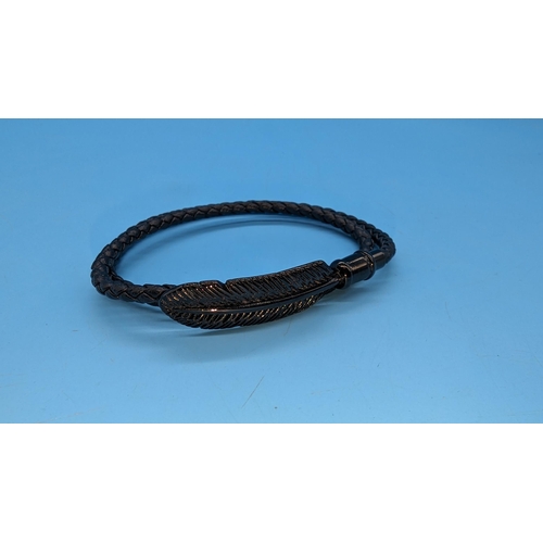 583 - Black metal effect feather wraparound bracelet, engraved 