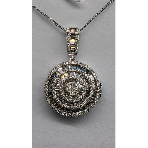 468 - Large round 9ct White Gold cluster locket/pendant sent with baguette and round brilliant cut diamond... 