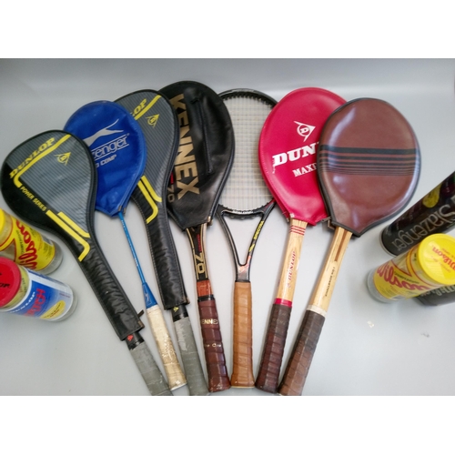 1249 - A Quantity of Tennis and Badminton Rackets and Balls and Shuttlecocks.