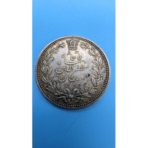 565 - An Iranian 1902 Silver 5000 Dinar/5 Qiran Coin in Muzaffar al-Din-Shah. 1896-1907.