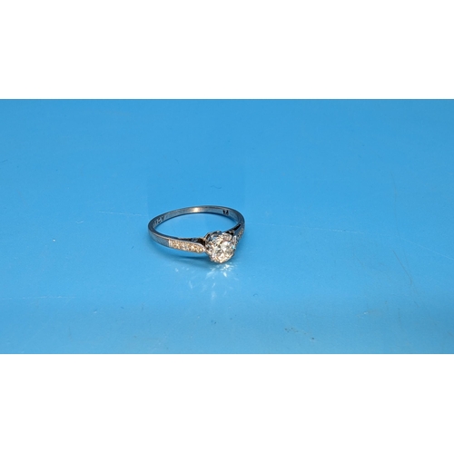 457 - A Platinum and 0.3ct Diamond Ring with Diamond Accents.