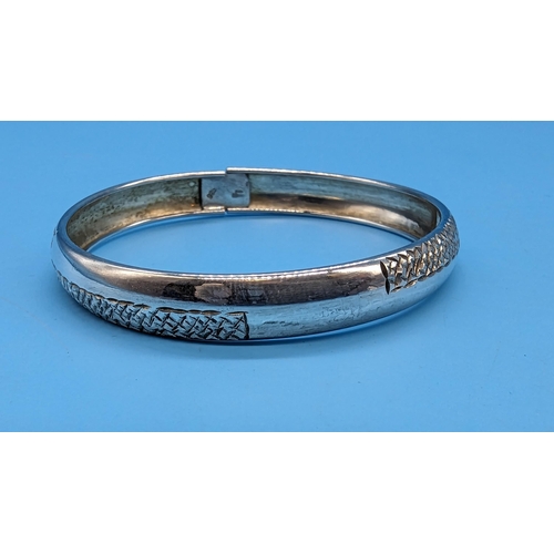 528 - A Hallmarked .925 Silver Bangle 30gms.