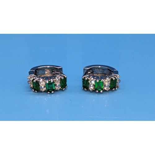 522 - A Pair of .925 Silver White and Green Stone Hinged Earrings.