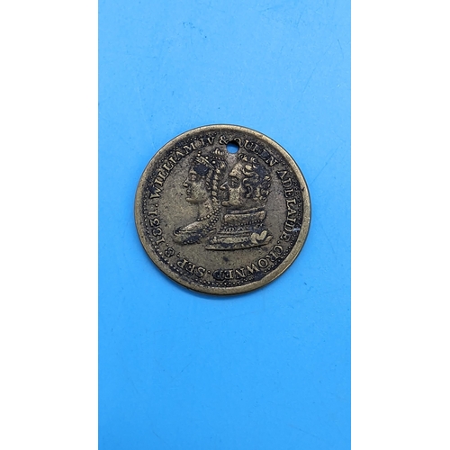 563B - An 1831 William IV and Queen Adelaide Medallion.