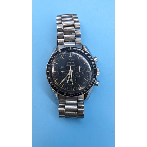 554 - A 1966 Omega Speedmaster Professional Moonwatch with original Guarantee and Purchase Receipt. Engrav...