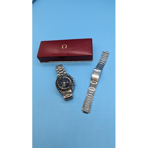 554 - A 1966 Omega Speedmaster Professional Moonwatch with original Guarantee and Purchase Receipt. Engrav... 