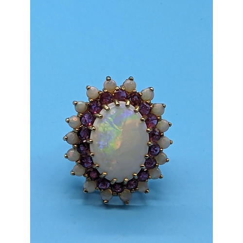 459 - A Large White Opal and Amethyst Cocktail Ring in a 9ct Yellow Gold Setting.