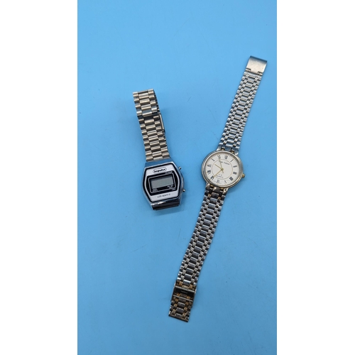 560 - An Impulse Vintage Digital Watch and George Valenti Quartz Watch.