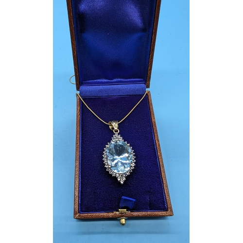 469 - A 9ct Blue Topaz Pendant Necklace 12.33 Grams total weight