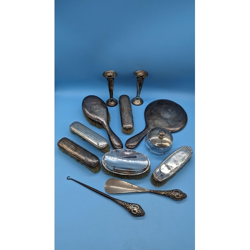 553 - A Collection Of Hallmarked Silver Vanity Brushes, Mirror, Button Hook, Shoe Horn etc.