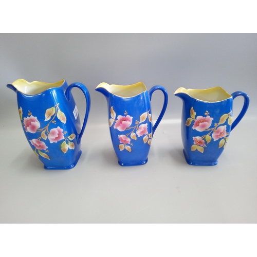 810 - Set of Three Rubian Floral Pattern Jug in Graduating Sizes.