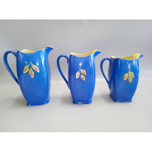 810 - Set of Three Rubian Floral Pattern Jug in Graduating Sizes.