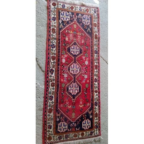 282 - A Handmade Wool Runner, 205cm x 75cm.