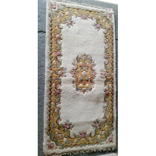 283 - A Handmade Wool Rug by Eastern Carpets, Benlian Ltd.
190cm x 90cm.