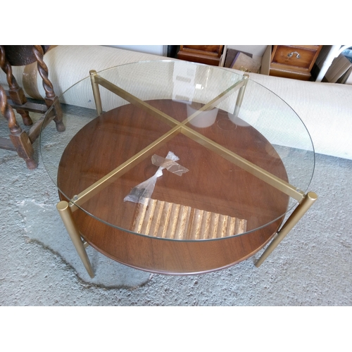 616 - A Mid Century Glass Topped Wood and Brass Coffee Table.