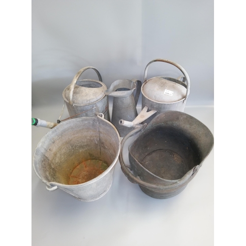 56 - 2 Galvanised Watering Cans, A Galvanised Jug, Bucket and Helmet Coal Scuttle.