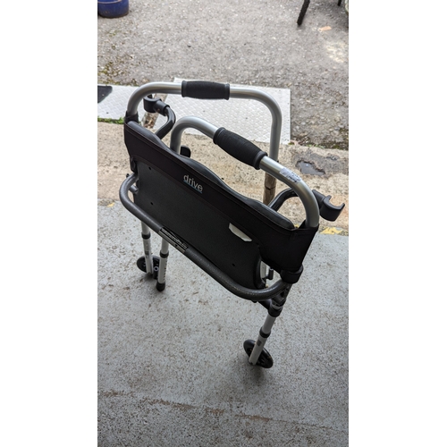 74 - A Drive Mobility Folding Walking Frame with Seat. Unused. RRP £185