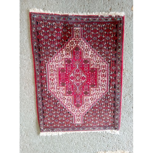 284 - Handmade Wool Rug 100cm x 72cm.