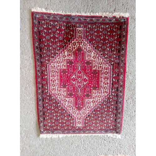 284 - Handmade Wool Rug 100cm x 72cm.