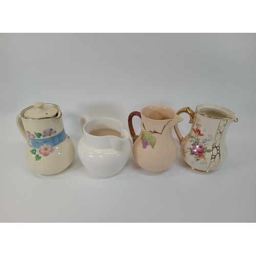 778 - A Selection of 4 Jugs.