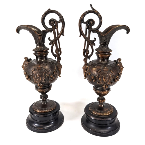 354 - A Pair of Napolean III Renaissance Style Bronze Ewers. 38cm H.