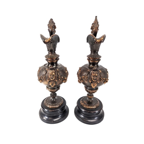 354 - A Pair of Napolean III Renaissance Style Bronze Ewers. 38cm H.