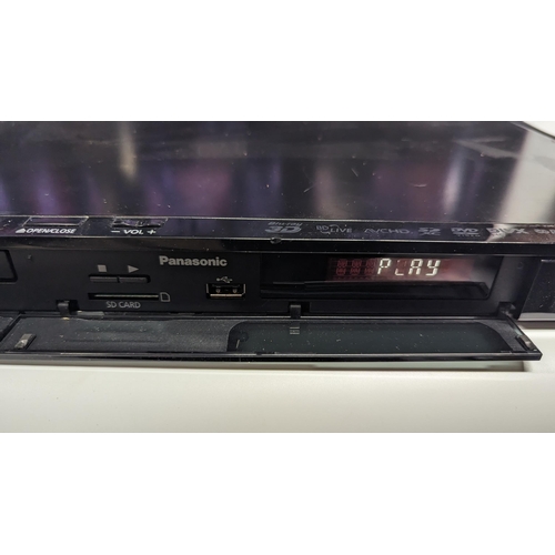 1220 - A Panasonic 3D Blu Ray Player Model SA-BTT270 (no remote). (TV Shown in Picture not included).