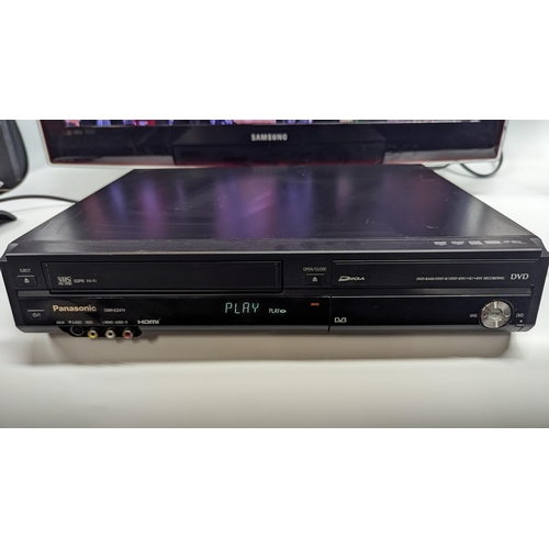 1219 - A Panasonic DMR-EZ47V Combination VHS Video Tape and DVD Player (no remote, TV shown not included). ... 