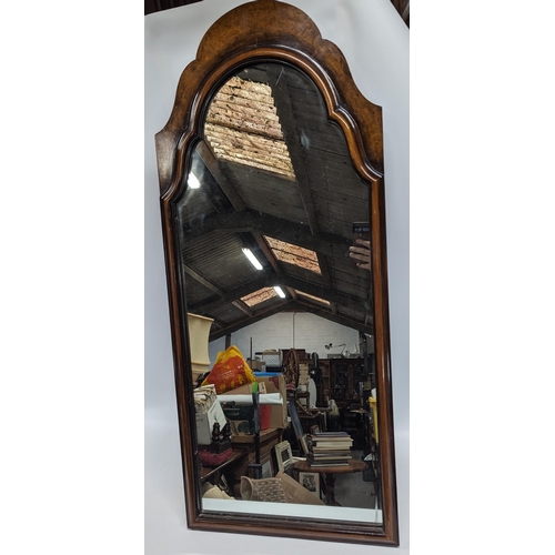 235A - An Edwardian Wall Mirror, 110 x 47cm.