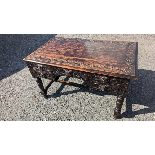 358 - Green Man Carved Oak Desk. 76cm H x 123cm L x 72cm D.