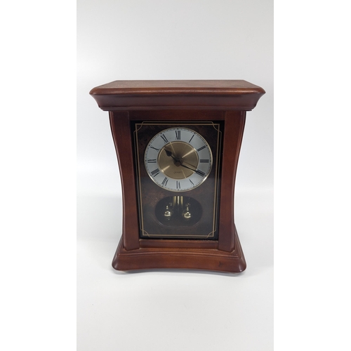 432 - A Quartz Mantle Clock.