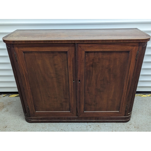 401 - A Mahogany Two Door Cabinet.